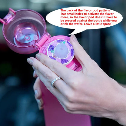 Pink water bottle with a flavor pod mechanism held by a hand, with text explaining its use.