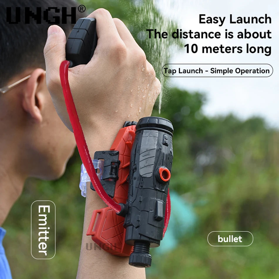 Person holding a red and black emitter with text about easy launch distance and operation.
