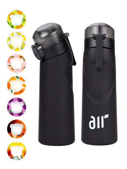 Black water bottles with colorful silicone wraps on a white background
